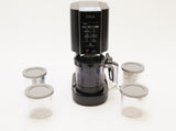 Ninja CREAMi Ice Cream, Sorbet, Milkshake Maker + 4 CREAMi Pints, Black (Used)