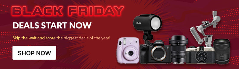 Focus Camera: Black Friday advertisement with camera equipment and 'Shop Now' button on a red background